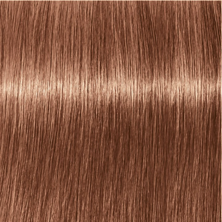 Close-up of brown hair strands with a focus on texture and color.